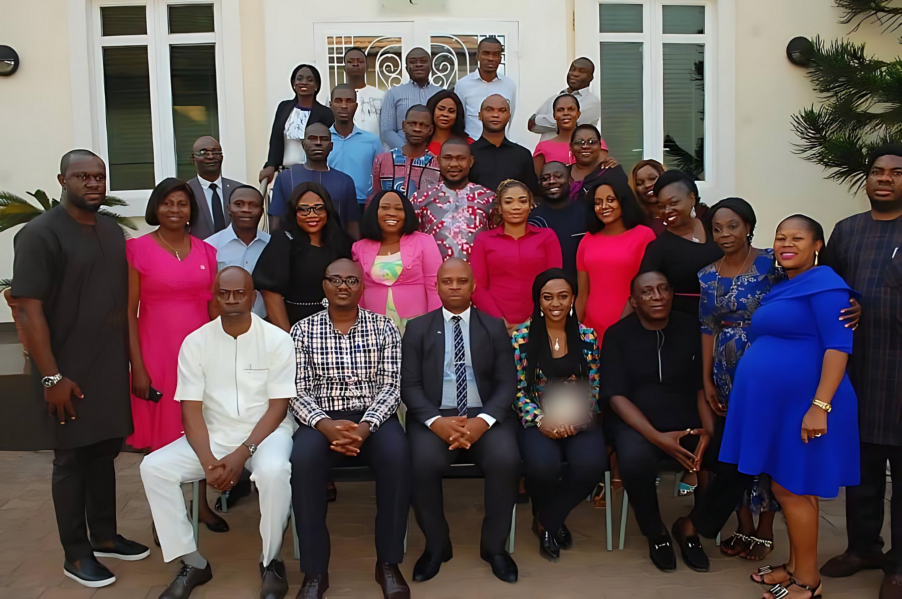 Chuba Nkala seated with a cohort after a programme
